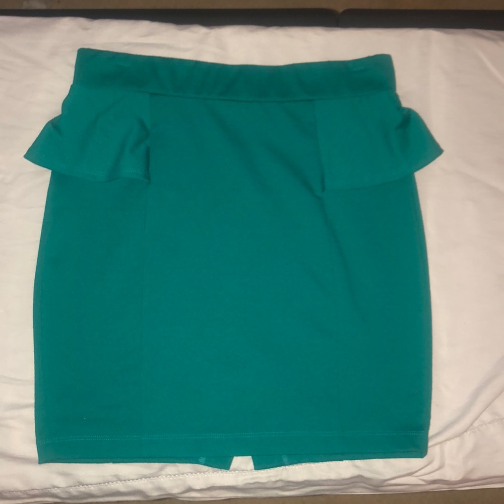 Green peplum skirt